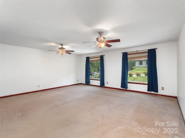 51 Wake Robin Way, Asheville, NC 28805 - carpeted spare room with ceiling fan, baseboards, and a textured ceiling
