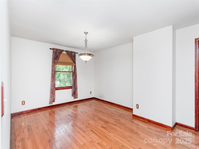 51 Wake Robin Way, Asheville, NC 28805 - spare room featuring light wood-style flooring and baseboards