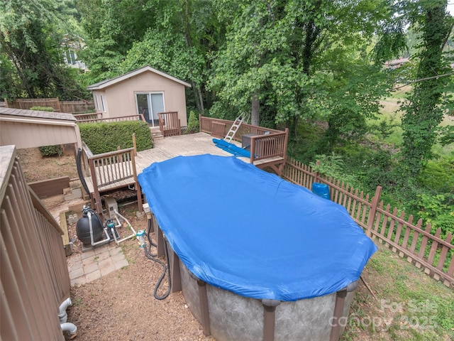 51 Wake Robin Way, Asheville, NC 28805 - view of pool featuring a deck, a fenced backyard, and an outdoor structure