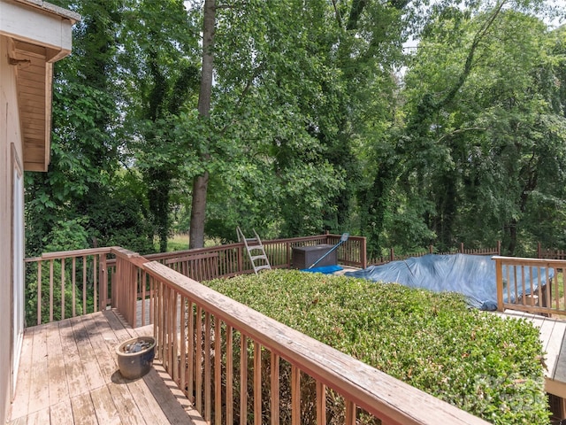 51 Wake Robin Way, Asheville, NC 28805 - deck featuring view of wooded area and a covered pool