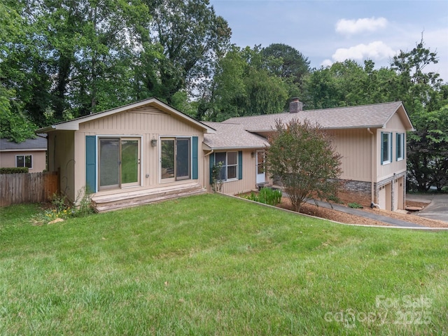51 Wake Robin Way, Asheville, NC 28805 - view of front facade featuring an attached garage, a chimney, and roof with shingles