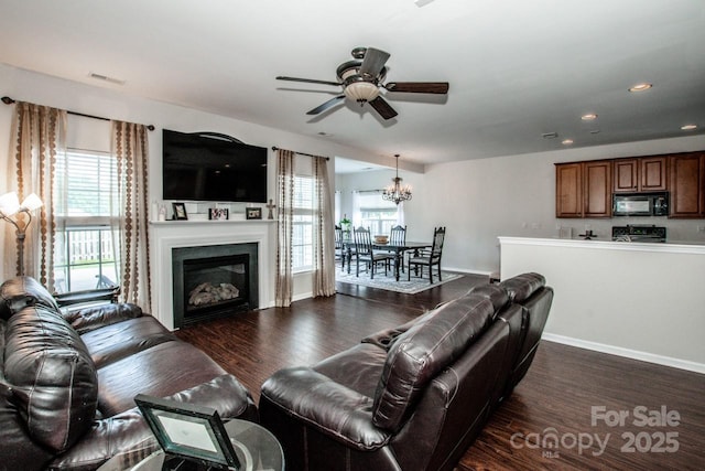 107 Golden Valley Dr, Mooresville, NC 28115 - living area featuring a ceiling fan, healthy amount of natural light, dark wood finished floors, a chandelier, and recessed lighting