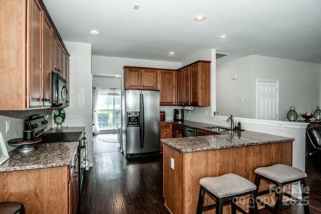 107 Golden Valley Dr, Mooresville, NC 28115 - kitchen with stainless steel refrigerator with ice dispenser, range with electric cooktop, a peninsula, black microwave, and dishwasher