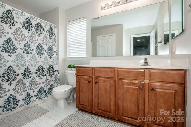 107 Golden Valley Dr, Mooresville, NC 28115 - full bath with toilet, vanity, a shower with shower curtain, and tile patterned floors