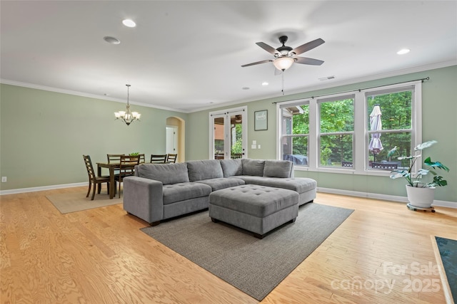 137 Leaning Tower Dr, Mooresville, NC 28117 - living room with light wood-type flooring, ornamental molding, recessed lighting, a chandelier, and ceiling fan