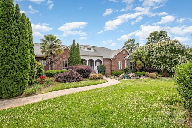 6823 Manatee Dr, Concord, NC 28025 - view of front of property featuring brick siding and a front yard