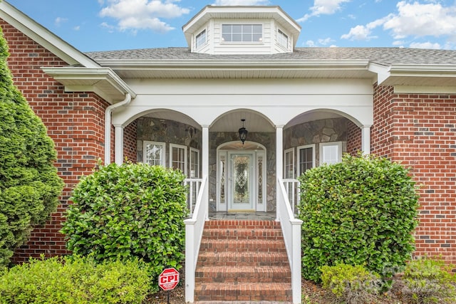 6823 Manatee Dr, Concord, NC 28025 - entrance to property with brick siding and roof with shingles