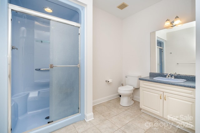 6823 Manatee Dr, Concord, NC 28025 - bathroom with tile patterned flooring, vanity, a shower stall, baseboards, and toilet