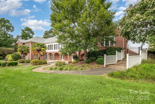 6823 Manatee Dr, Concord, NC 28025 - view of front of house with brick siding