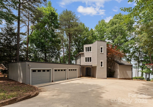 5075 Lakeview Cir, Sherrills Ford, NC 28673 - view of front of home featuring a garage and concrete driveway
