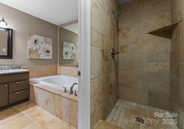 5075 Lakeview Cir, Sherrills Ford, NC 28673 - bathroom with vanity, a garden tub, and a tile shower