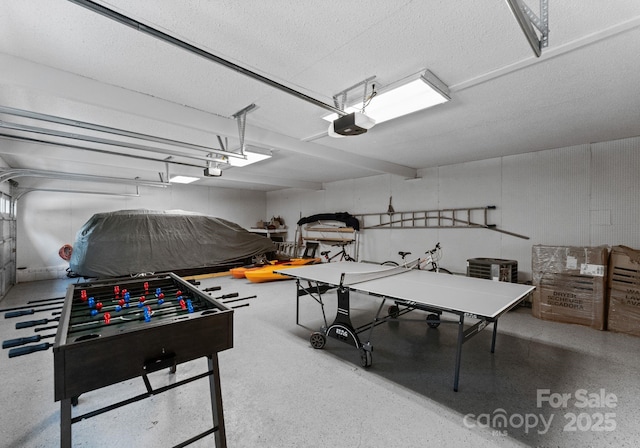 5075 Lakeview Cir, Sherrills Ford, NC 28673 - playroom featuring a garage, speckled floor, and a textured ceiling