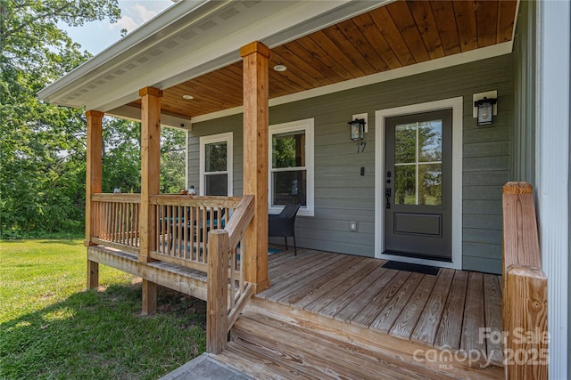 17 Baxter Woods Ln, Candler, NC 28715 - wooden porch with a lawn