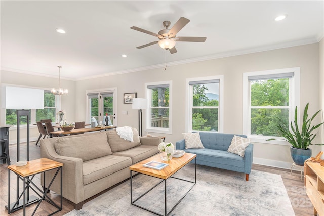 17 Baxter Woods Ln, Candler, NC 28715 - living area featuring light wood-type flooring, ornamental molding, a chandelier, a ceiling fan, and recessed lighting