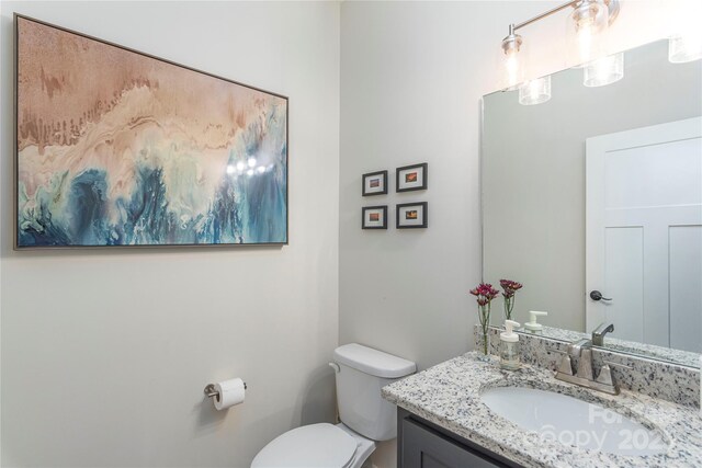 17 Baxter Woods Ln, Candler, NC 28715 - bathroom featuring vanity and toilet