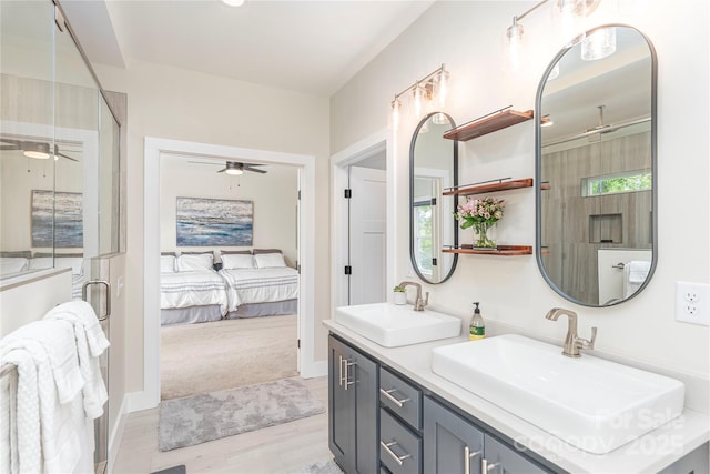 17 Baxter Woods Ln, Candler, NC 28715 - full bath featuring a ceiling fan, a stall shower, double vanity, and wood finished floors