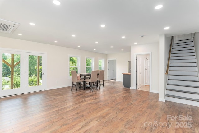 17 Baxter Woods Ln, Candler, NC 28715 - dining area featuring light wood finished floors, recessed lighting, and stairs