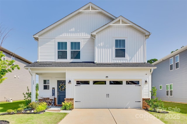 322 Olympia Way, York, SC 29745 - view of front of home featuring board and batten siding, driveway, a garage, and a front yard