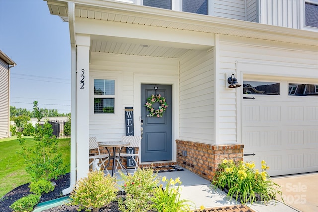 322 Olympia Way, York, SC 29745 - entrance to property with covered porch and an attached garage