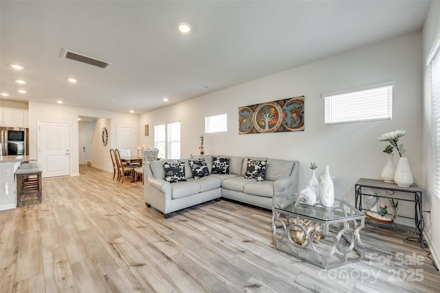 322 Olympia Way, York, SC 29745 - living room featuring light wood finished floors, recessed lighting, and baseboards