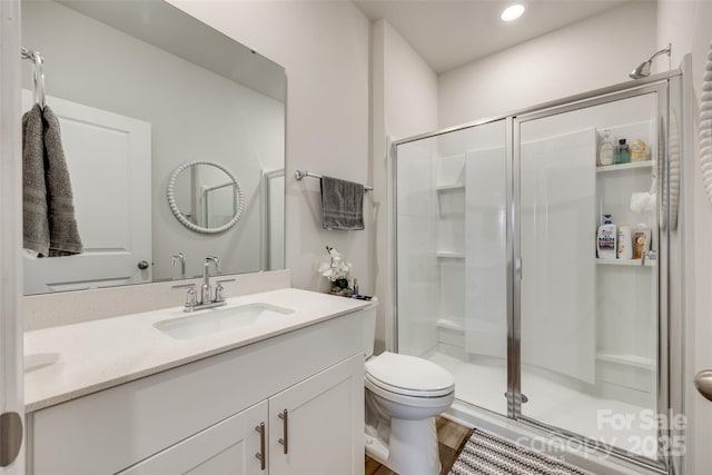 322 Olympia Way, York, SC 29745 - full bath featuring a shower stall, vanity, toilet, recessed lighting, and wood finished floors