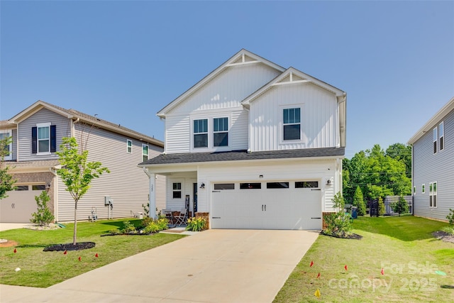 322 Olympia Way, York, SC 29745 - view of front of house with board and batten siding, an attached garage, driveway, and a front yard