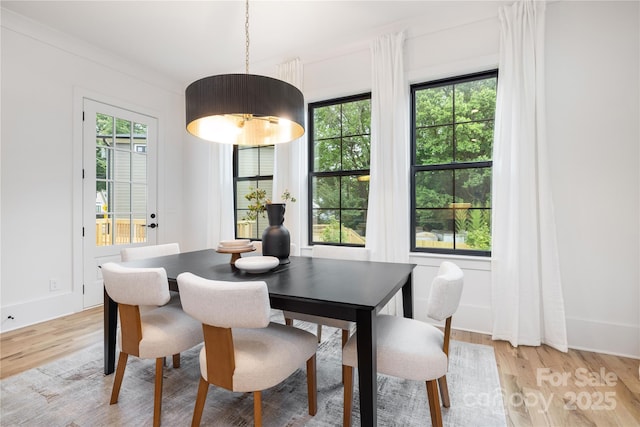 3903 Plainview Rd, Charlotte, NC 28208 - dining space featuring light wood-style flooring and baseboards