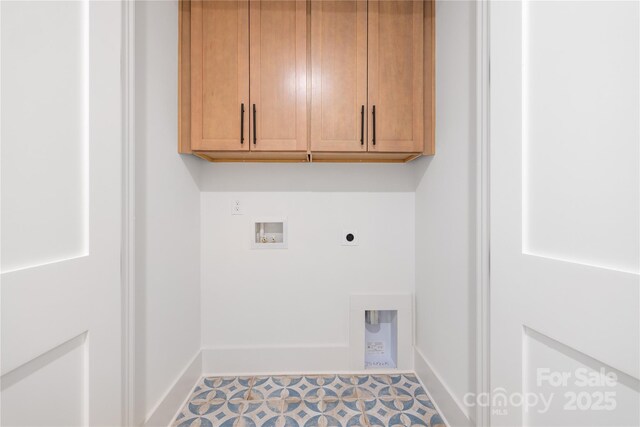 3903 Plainview Rd, Charlotte, NC 28208 - laundry room with cabinet space, washer hookup, baseboards, and electric dryer hookup