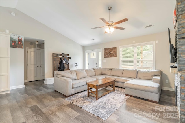 198 Anita Ln, Lexington, NC 27295 - living room featuring wood finished floors, ceiling fan, baseboards, and high vaulted ceiling