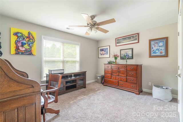 198 Anita Ln, Lexington, NC 27295 - home office featuring a ceiling fan, carpet flooring, and baseboards
