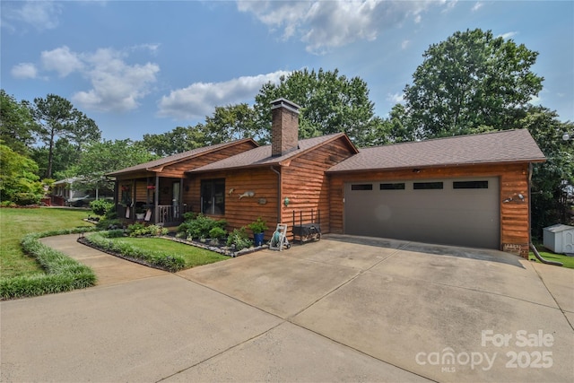 4920 Surfwood Dr, Sherrills Ford, NC 28673 - rustic home featuring concrete driveway, an attached garage, a chimney, and a front lawn