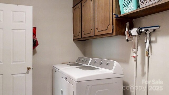 4920 Surfwood Dr, Sherrills Ford, NC 28673 - laundry area featuring washing machine and dryer and cabinet space