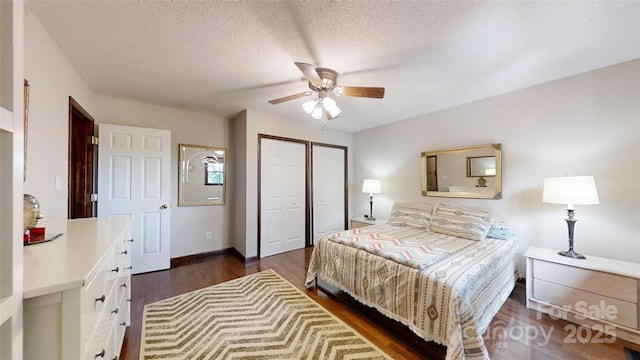 4920 Surfwood Dr, Sherrills Ford, NC 28673 - bedroom with a closet, dark wood-style flooring, a textured ceiling, ceiling fan, and baseboards