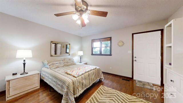 4920 Surfwood Dr, Sherrills Ford, NC 28673 - bedroom featuring wood finished floors, baseboards, and a ceiling fan
