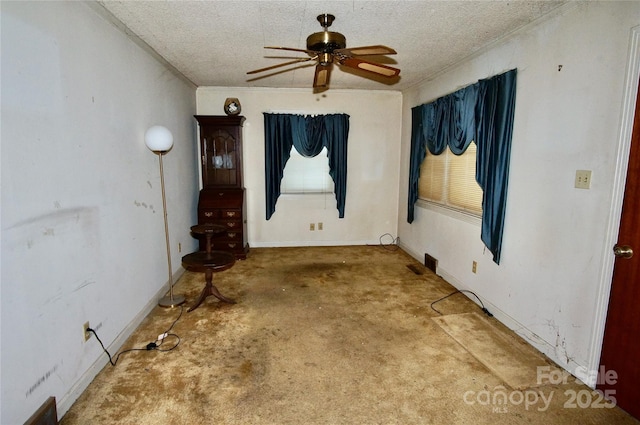 402 Villa St, Kannapolis, NC 28083 - carpeted empty room with a textured ceiling, a ceiling fan, and ornamental molding