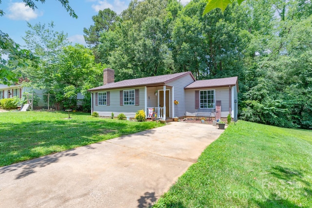 8019 Walnut Creek Ln, Charlotte, NC 28227 - single story home with driveway, a chimney, and a front yard