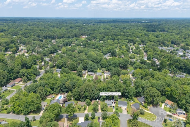 8019 Walnut Creek Ln, Charlotte, NC 28227 - aerial view of property and surrounding area featuring a heavily wooded area