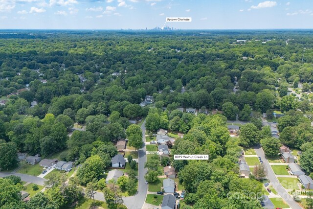 8019 Walnut Creek Ln, Charlotte, NC 28227 - aerial perspective of suburban area with a heavily wooded area