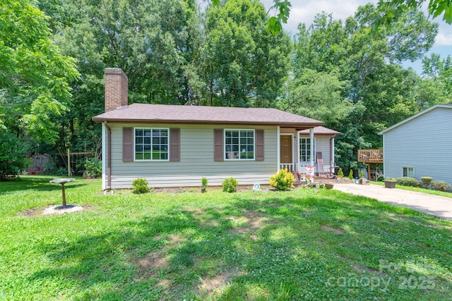 8019 Walnut Creek Ln, Charlotte, NC 28227 - view of front facade featuring a chimney and a front yard