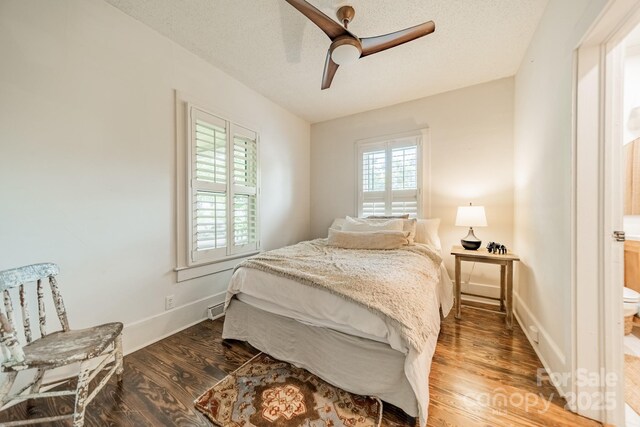 7901 Bud Henderson Rd, Huntersville, NC 28078 - bedroom with wood finished floors, ceiling fan, and a textured ceiling