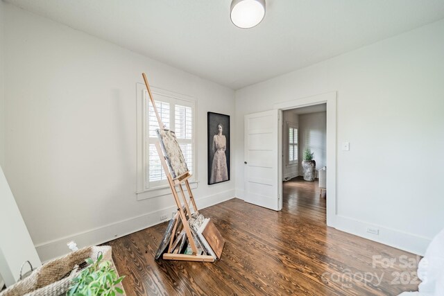 7901 Bud Henderson Rd, Huntersville, NC 28078 - empty room with baseboards and wood finished floors