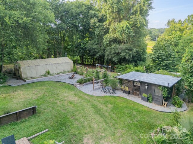7901 Bud Henderson Rd, Huntersville, NC 28078 - view of grassy yard with an outdoor structure