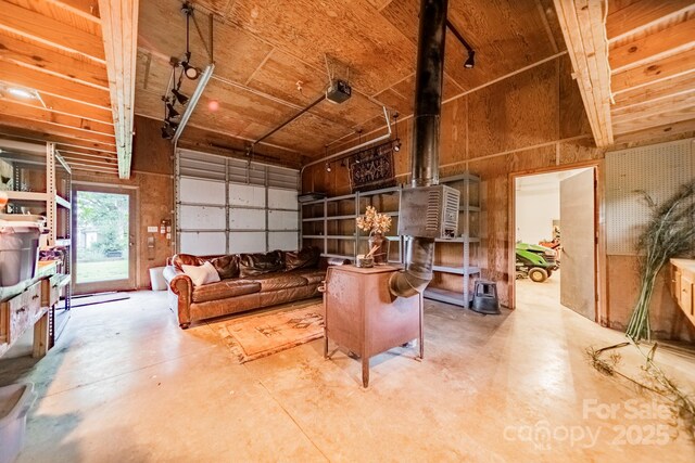 7901 Bud Henderson Rd, Huntersville, NC 28078 - living area featuring concrete flooring and a garage