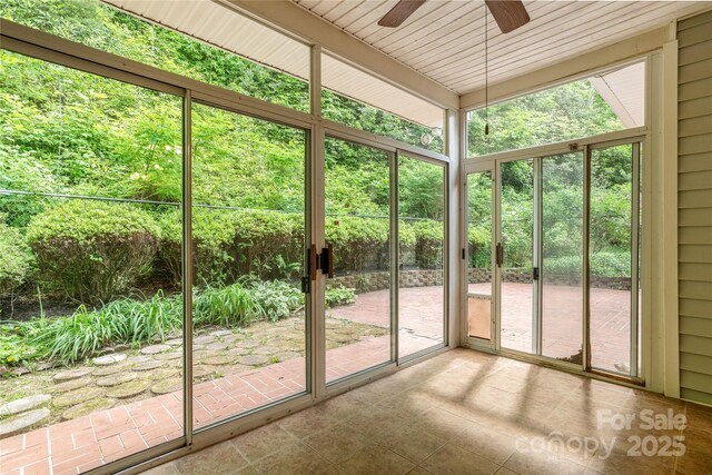 93 Wood Duck Ct, Brevard, NC 28712 - unfurnished sunroom with ceiling fan and plenty of natural light