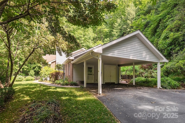 93 Wood Duck Ct, Brevard, NC 28712 - view of parking with asphalt driveway and an attached carport