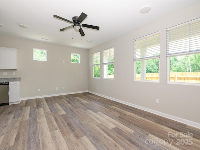 614 Kings Mountain St, Clover, SC 29710 - unfurnished living room featuring wood finished floors and a ceiling fan