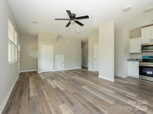 614 Kings Mountain St, Clover, SC 29710 - unfurnished living room featuring light wood-style floors and ceiling fan