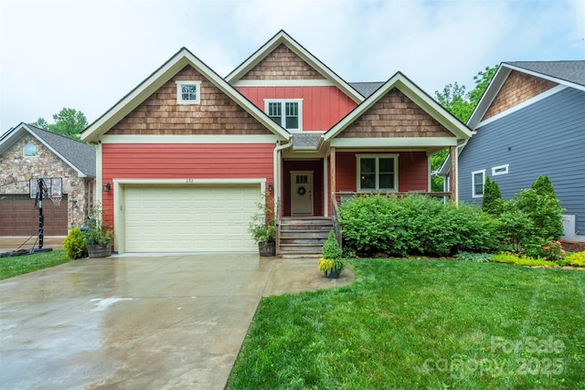 253 Flat Creek Rd, Black Mountain, NC 28711 - craftsman inspired home featuring concrete driveway, an attached garage, a front yard, a porch, and board and batten siding