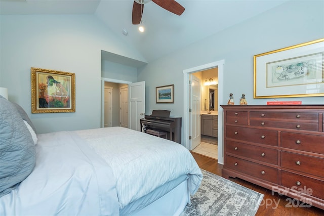 253 Flat Creek Rd, Black Mountain, NC 28711 - bedroom featuring dark wood-style floors, ensuite bath, high vaulted ceiling, and ceiling fan