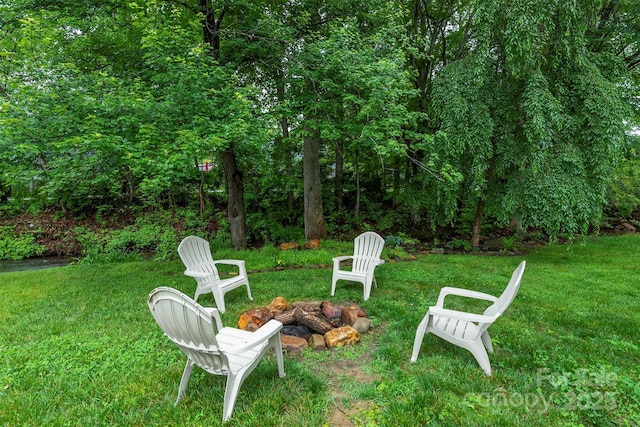 253 Flat Creek Rd, Black Mountain, NC 28711 - view of green lawn with an outdoor fire pit